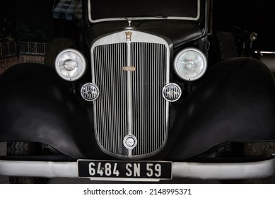 Retro car AUDI. Radiator grille and headlight lamp on vintage car. Dukora, Belarus - June 13, 2020