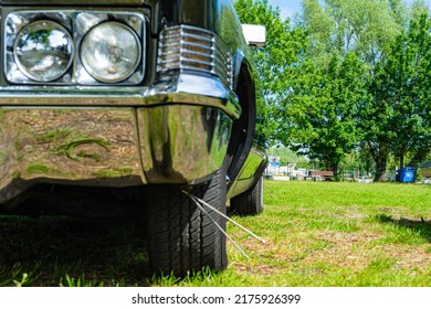 Retro Car Low Angle View. View Of The Chrome Bumper.