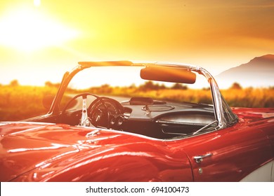 retro car on road and golden autumn space  - Shutterstock ID 694100473