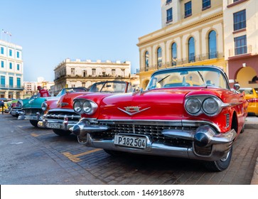 Retro car as taxi for tourists in Havana, Cuba. Captured near Gran Teatro de La Habana, El Capitolio and Paseo del Prado in spring 2019 - Shutterstock ID 1469186978