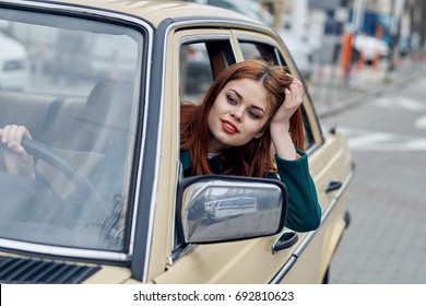 Retro Car Woman Driving Out Window Stock Photo 692810623 | Shutterstock