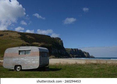 A Retro Caravan At The Beach