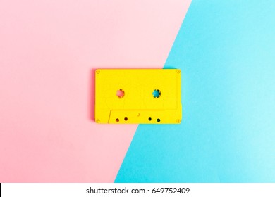 Retro cassette tapes on a bright duotone background