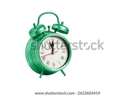 retro clock, pointer clock, green color alarm clock on isolated white background close up