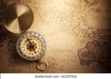Retro compass with vintage map - Shutterstock ID 611297216
