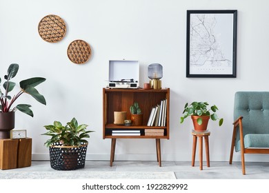 Retro Composition Of Living Room Interior With Mock Up Poster Map, Wooden Shelf, Book, Armchair, Plant, Cacti, Vinyl Recorder, Decoration And Personal Accessories In Stylish Home Decor.