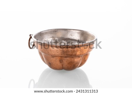 Retro copper tea cup, a timeless piece for stylish tea presentation, isolated on a clean white background, adding elegance to any tea-related design concept.