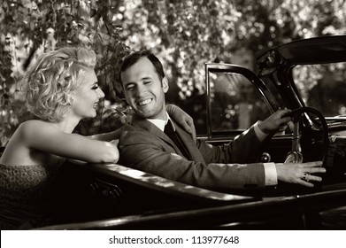 Retro Couple In Convertible