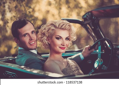 Retro Couple In Convertible