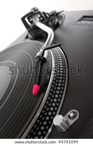 Retro DJ turnt table deck playing music