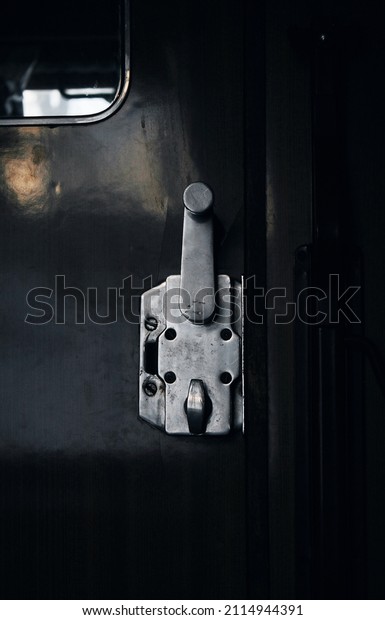 Retro door\
lock, on the car door, with a\
mirror