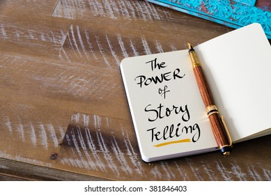 Retro effect and toned image of notebook next to a fountain pen. Business concept image with handwritten text THE POWER OF STORY TELLING , copy space available