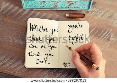 Retro effect and toned image of a woman hand writing on a notebook. Handwritten quote Whether you think you can or you think you can't, you're right - Henry Ford as inspirational concept image