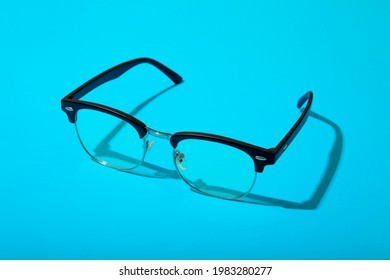 Retro Eyeglasses Isolated On A Blue Background