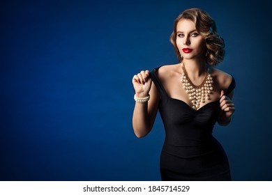 Retro Fashion Model, Old Fashioned Woman Beauty Portrait In Black Dress, Hairstyle Makeup Luxury Jewelry Over Blue Background