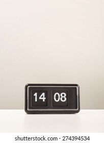 Retro Flip Clock Sitting On White Desk