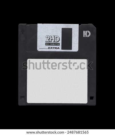 Retro 3.5” Floppy Disk mockup with white empty label sticker, disk on black background, old vintage storage png diskette