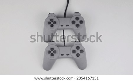 Retro Game controllers on white background