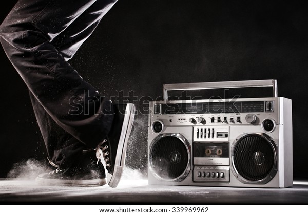 Retro ghetto blaster, dust and dancer\
isolated on black background with clipping\
path