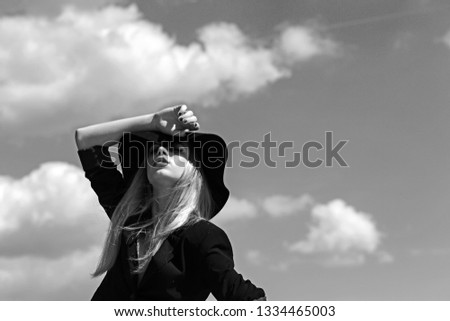 Similar – Image, Stock Photo Cool blonde woman performing dancing at sunset and raising the hand close to her head