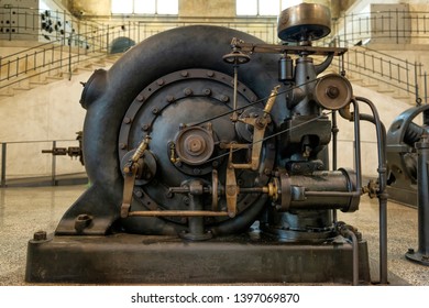 Retro Hydro Turbine At The Power Plant. Vintage Machinery.