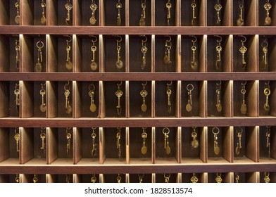 Retro keys in wooden storage, hotel reception, old vintage style, all keys in a place - Powered by Shutterstock