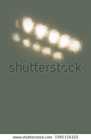retro lamp reflection on ceramic tile