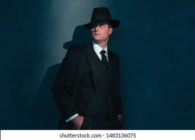 Retro Man In Hat Wears Suit And Tie.