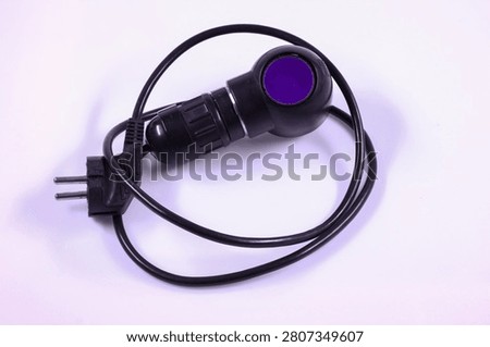 Retro microscope lighting module with optical mount, ventilation housing and power cable. Scientific laboratory equipment accessory isolated on white.