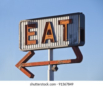 Retro Neon Eat Sign Ruin In Early Morning Light.