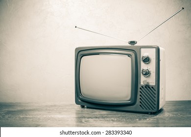 Retro Obsolete TV From 70s. Vintage Old Style Sepia Photo