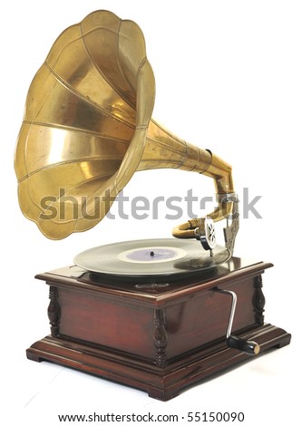 retro old gramophone with horn speaker  for playing music over plates  isolated on white in studio