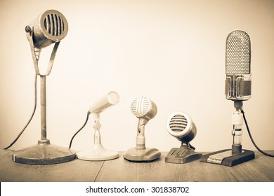 Retro Old Microphones For Press Conference Or Interview. Vintage Style Sepia Photo