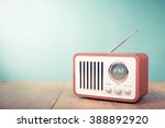 Retro old radio front mint green background. Vintage style filtered photo