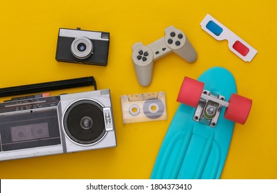 Retro old school attributes 80s on yellow background. Top view. Flat lay - Shutterstock ID 1804373410