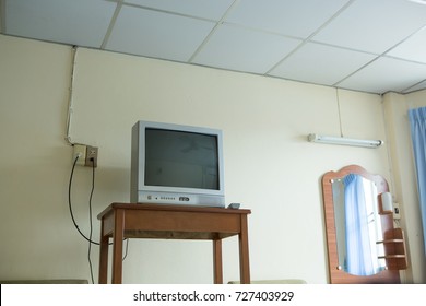 Retro Old Television From 90s On Table In Old Motel Room