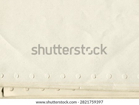 Retro perforated paper texture for dot matrix printers. Old antique sheet paper texture for design.