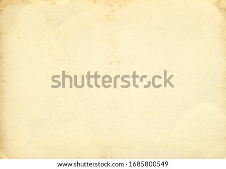 Retro photo paper texture. Old antique paper texture. Vintage paper background. Aged and yellowed paper