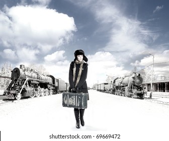 Retro photo of young and attractive woman on the train station