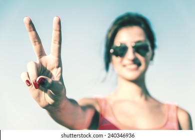 Retro Photo Of Young Girl With Victory Sign - Shutterstock ID 240346936
