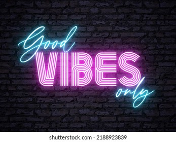 A retro pink and blue colored neon sign - Good Vibes Only - in front of a brick background. Signage for a bar, club or restaurant. Nightlife concept.