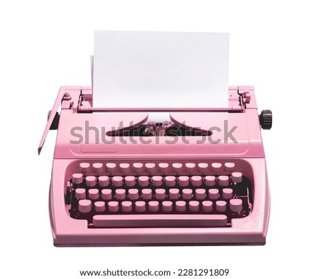 Retro pink typewriter with empty page. Isolated on white.