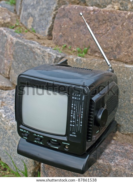 Retro portable\
television and radio set,\
outdoor