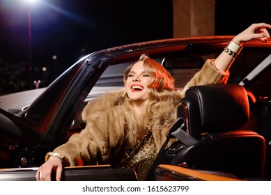 Retro Portrait Of A Beautiful Luxury Gatsby Woman In Black Convertible Car. Vogue Fashion Style And Smoke. Model With A Hollywood Smile. Copy Space