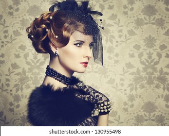 Retro Portrait Of  Beautiful Woman. Vintage Style. Fashion Photo