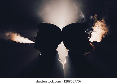 Retro Portrait Of Two Young Men Smoking Hookah In The Cafe. Concept Of Having A Good Time In Retro Style. Silhouette Close View