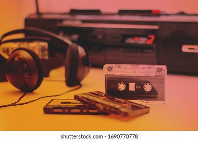 Retro Postcard Or Picture. Audio Cassettes On The Background Of The Player. Retro Style And Gradient