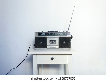 Retro Radio Cassette on a white table - Shutterstock ID 1938737053