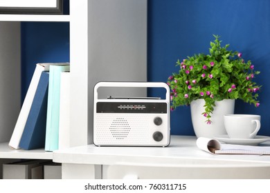 Retro radio on table in room - Shutterstock ID 760311715