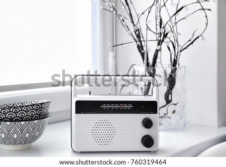 Retro radio on window sill